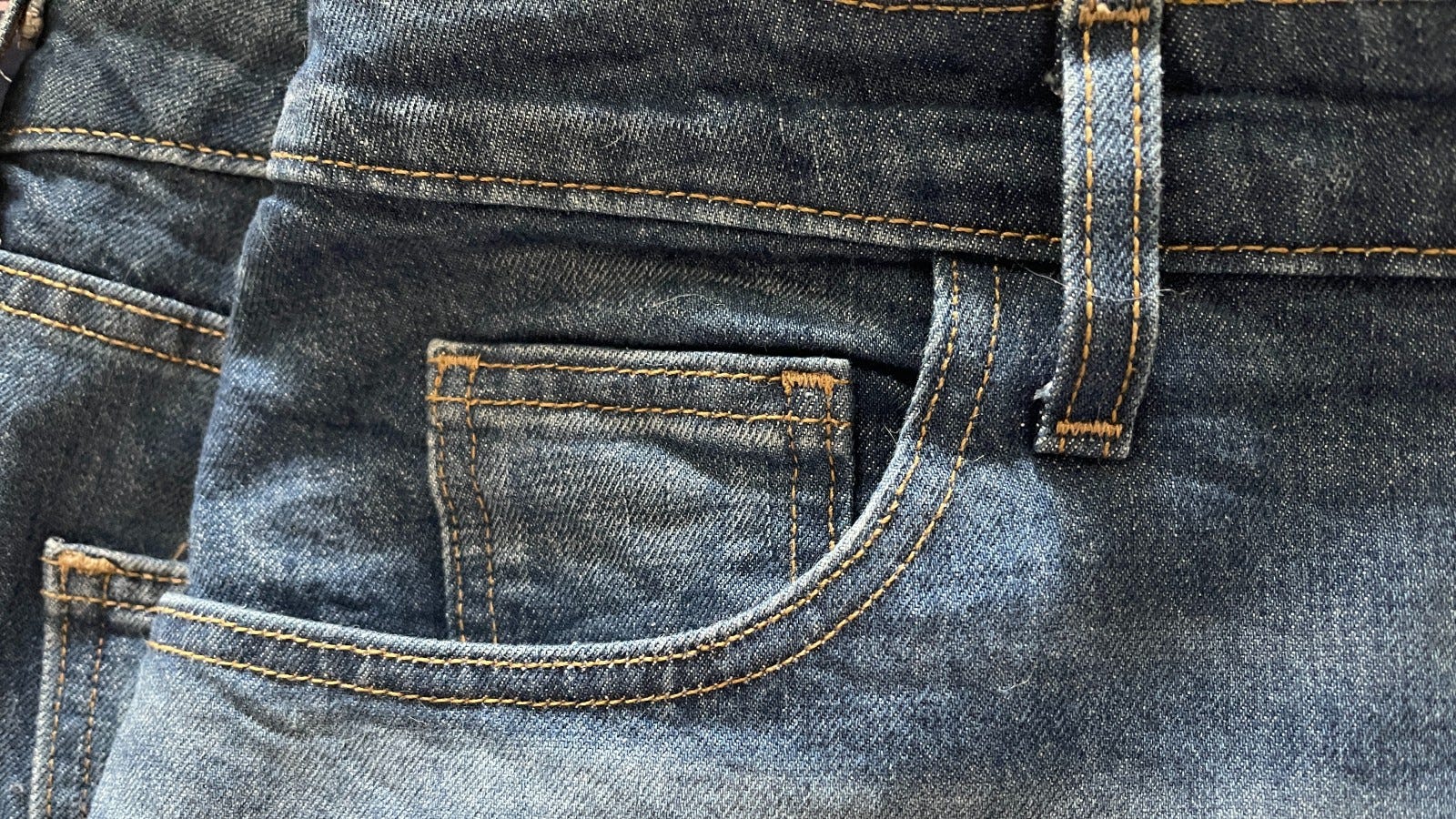 Why Do Jeans Have Those Tiny Pockets?