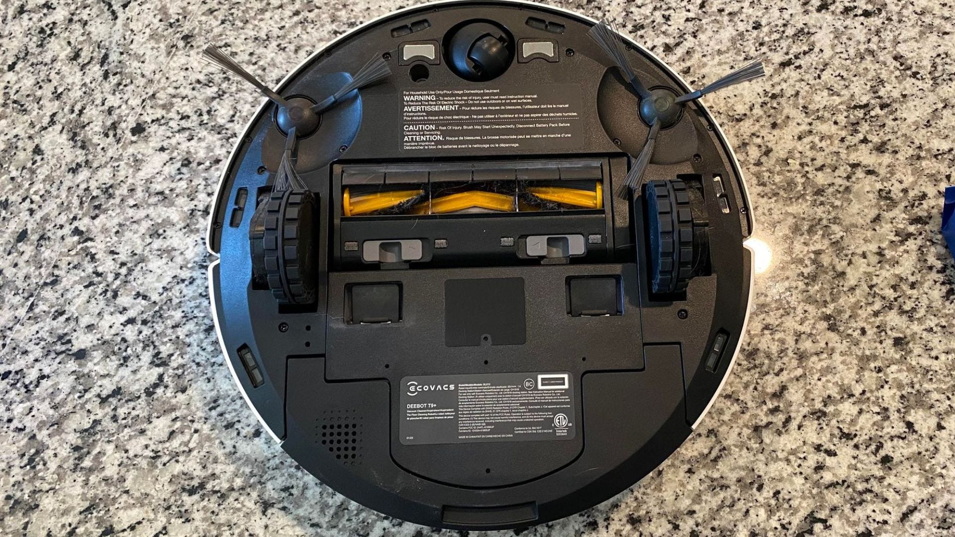 Underside of ECOVACS DEEBOT T9+ with roller and brushes