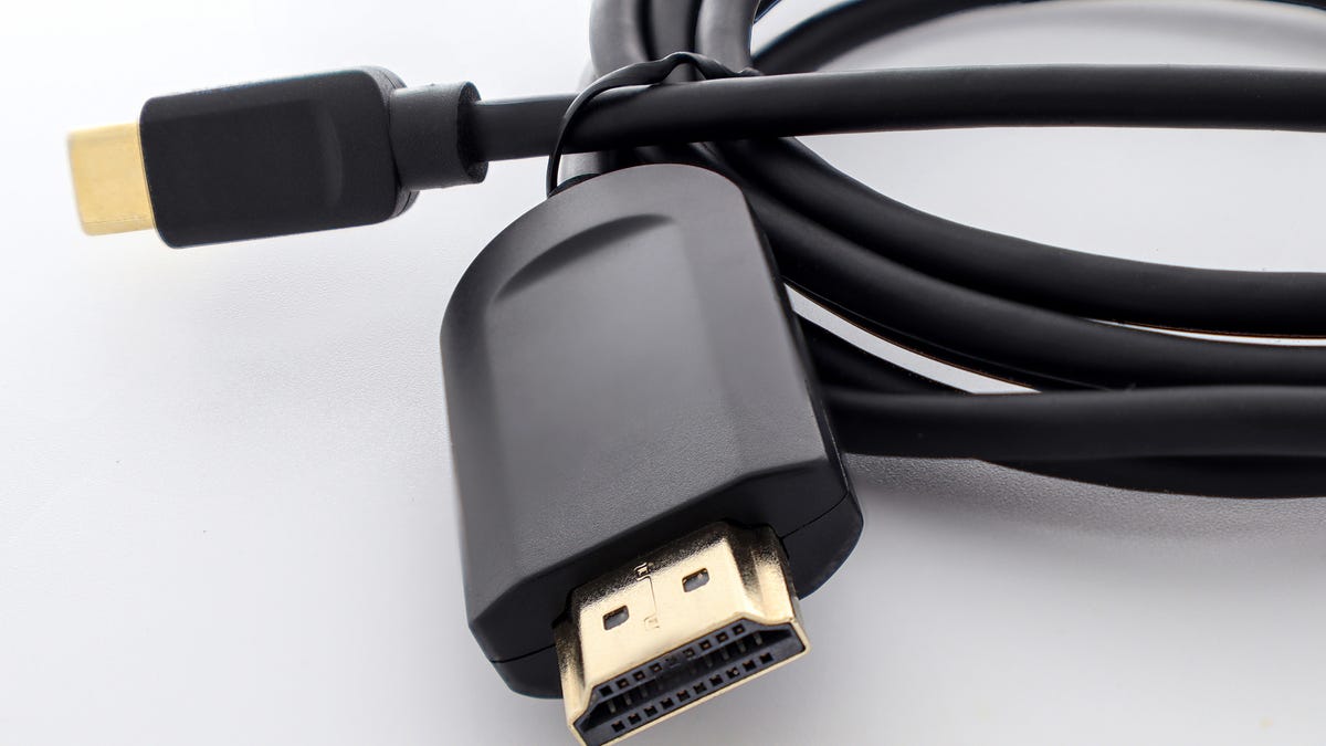 USB-C to HDMI cable sitting on a surface.